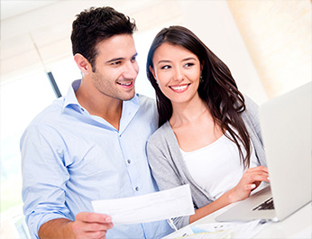 savings account panel near fulton ny from fulton savings bank couple reviewing account online